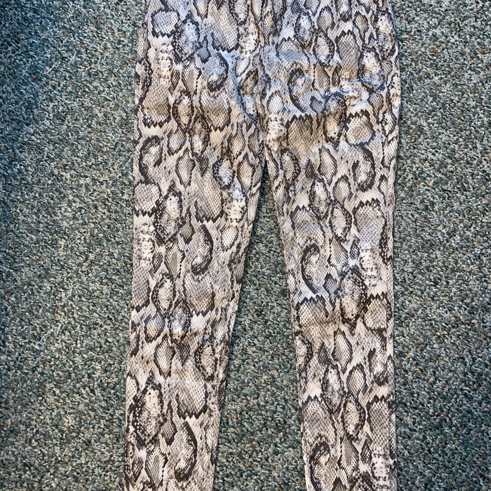 Snakeskin print jeans